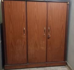 wood 3 doors cupboard good in condition