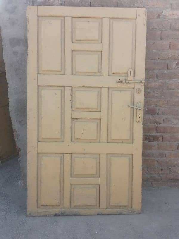 DOOR SOLAD WOODEN HIGHT 5 FEET 11 INCH WEDTH 3 FEET 5 INCH 7