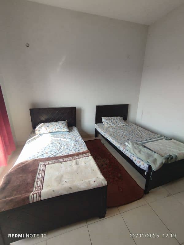 2 single bed in very good condition with mattress and free bed sheet 1