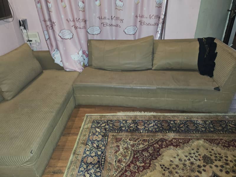 2 L shape sofa urgent sale 35000 1