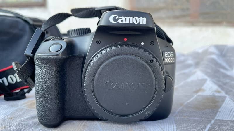 Canon 4000D DSLR camera and 2 month used is new 2