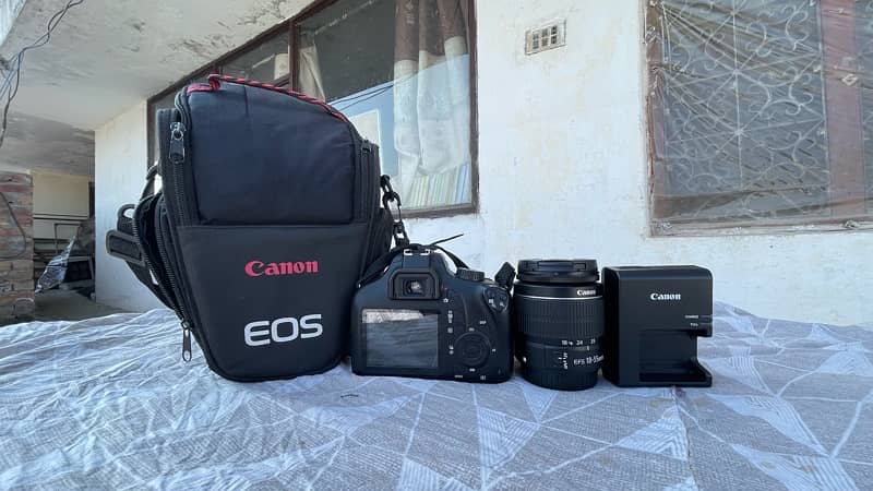 Canon 4000D DSLR camera and 2 month used is new 3