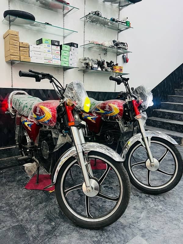 Original electric scooties and bikes available at alwasay traders 7