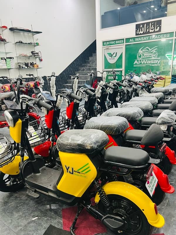 Original electric scooties and bikes available at alwasay traders 9