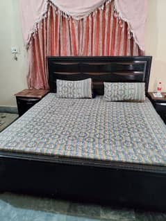 wooden bed black color good condition