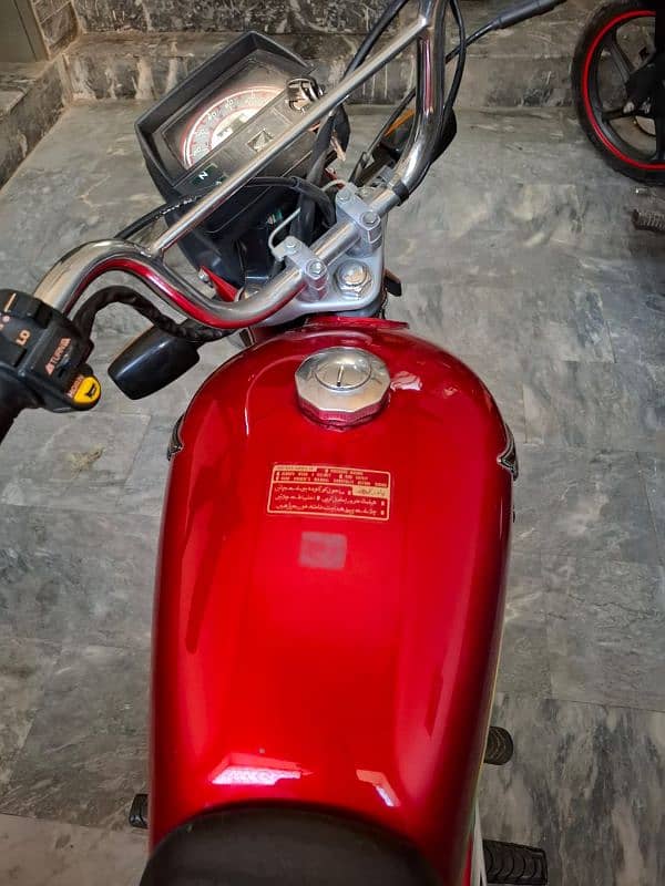 Honda cd70cc 10 by 10 condition look like new 0