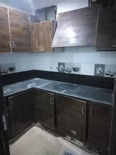 Portion for rent for bachelor for family 2bed tv lounge 2bath kichan Pani 24 hours bijli gass sab available location walyat homes