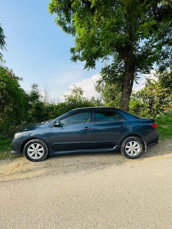 Toyota Corolla Altis 2010 /03317128595 0