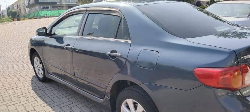 Toyota Corolla Altis 2010 /03317128595 4