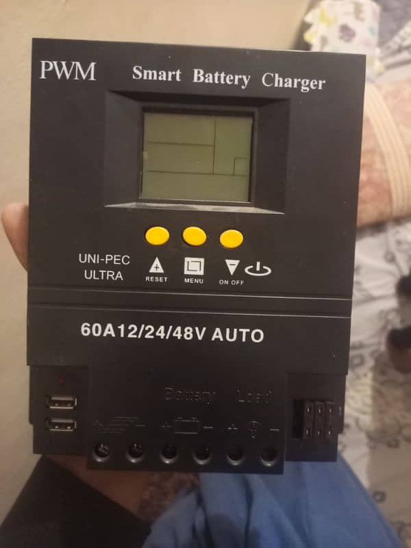 solar charge controller, DC to AC converter and 100 battery 1