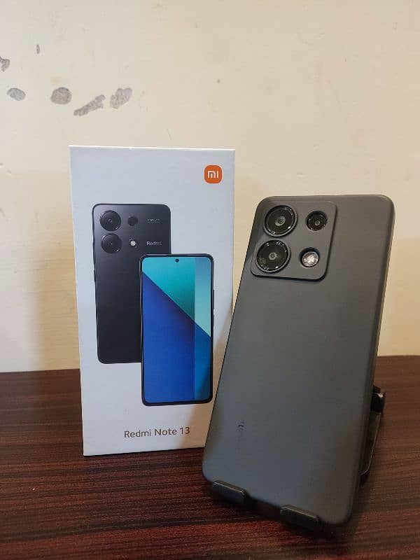 Redmi note 13 open box condition 8/128gb.          4gb ram expendable 2