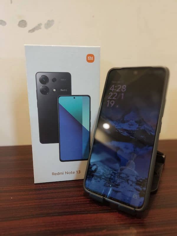 Redmi note 13 open box condition 8/128gb.          4gb ram expendable 3