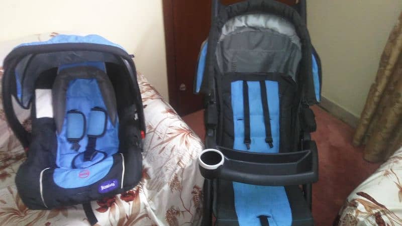 baby cot and pram 7