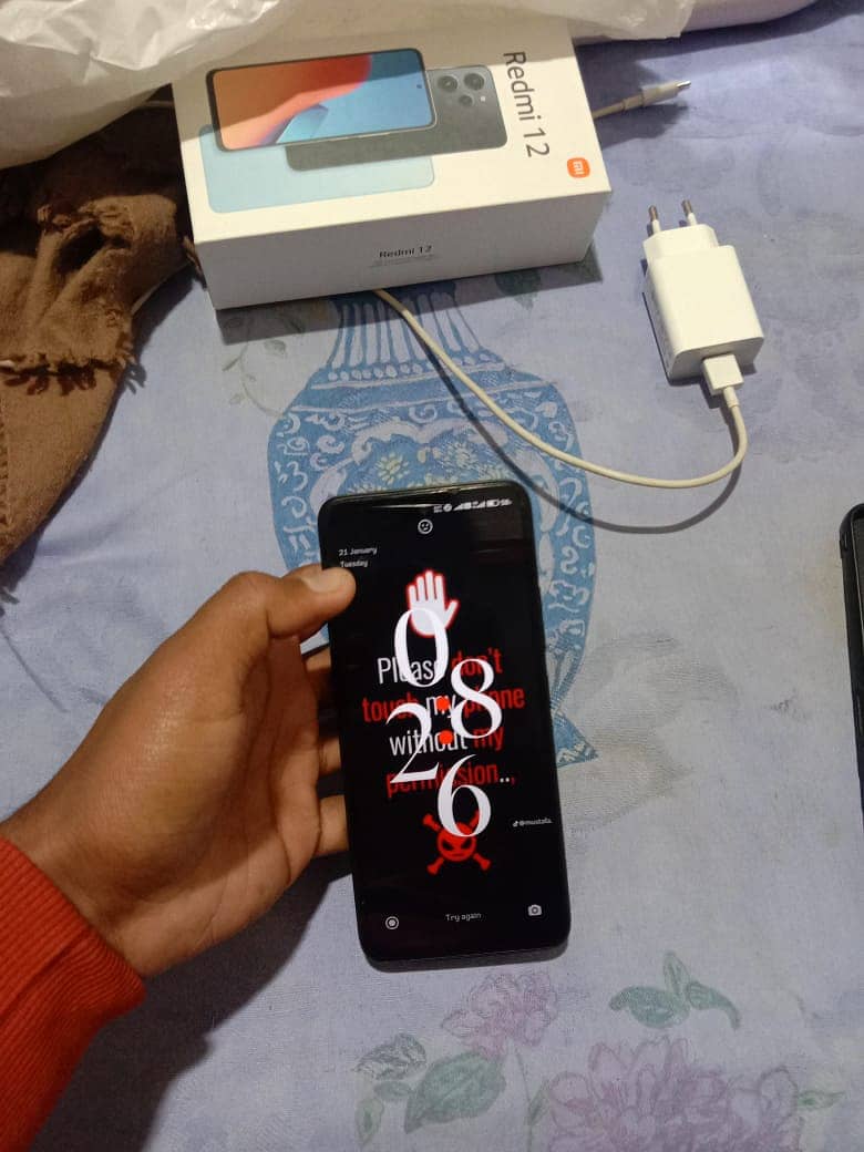 Redmi 12 for sale all ok with 5 to 6 month varenti contact on Whatsapp 4