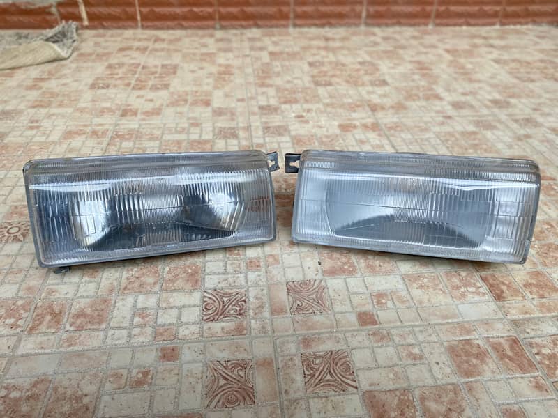 Nissan sunny headlights, speedo meter, front grill 1