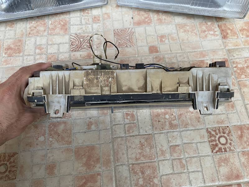 Nissan sunny headlights, speedo meter, front grill 4