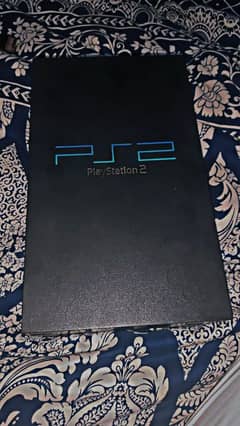 PS2 GAMING CONSOLE WITH 12 CDS, 2 MEMORY CARD, 1 CONTROLLER