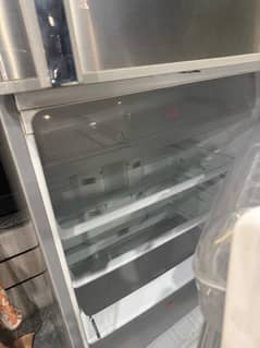 haier full size fridge 8/10 condition in chrome body for sale