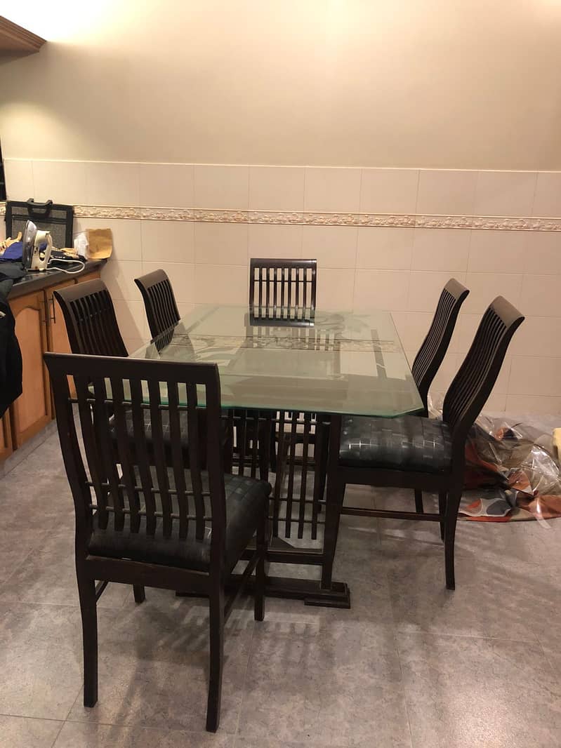 Elegant glass top dining table 6 seater 2