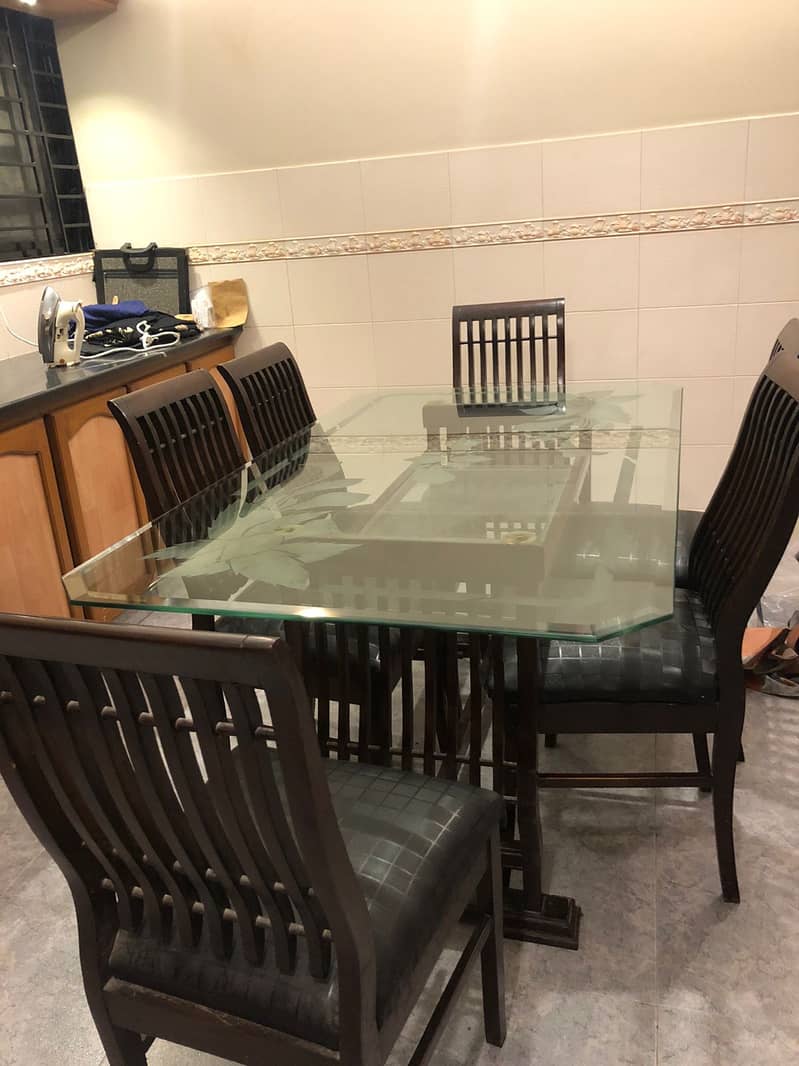 Elegant glass top dining table 6 seater 3