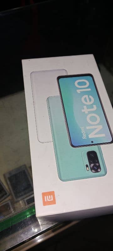 xiomi Redmi note 10 4gb 128 gb with box and charger in good condition. 0