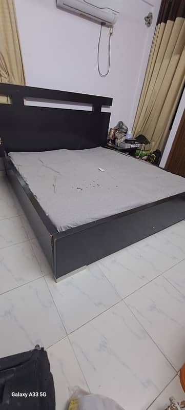 Wooden bed with 02 side tables with 02 bedroom chairs 1