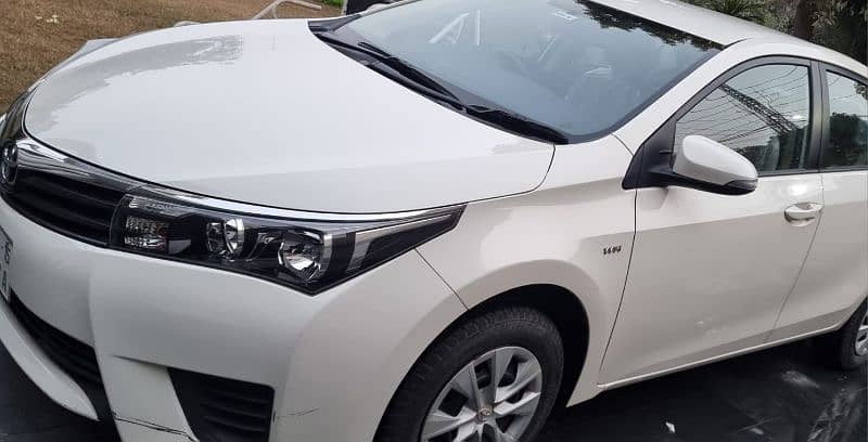 Toyota Corolla XLI 2015 14K mileage 1