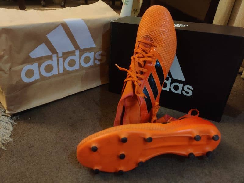 Football shoes/Studs/Toes Adidas Ace 17.3FG orange & black 0