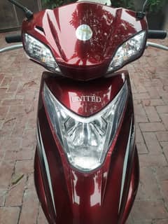 united scooty 100cc