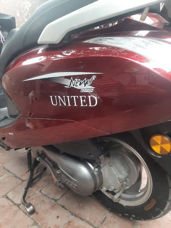 united scooty 100cc 3