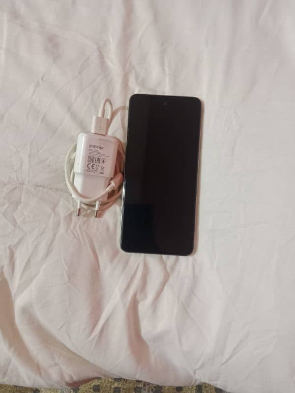 Infinix hot 40i 8+8 128gb under warranty new condition 1