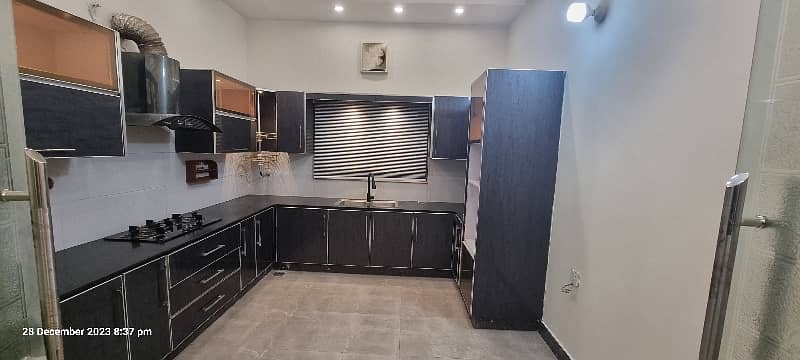 10 Marla House For Sale In Model City Having 5 Beds With Attached Bath 4 Kitchens Wide BBQ Area For Visit Call Or WhatsApp 16