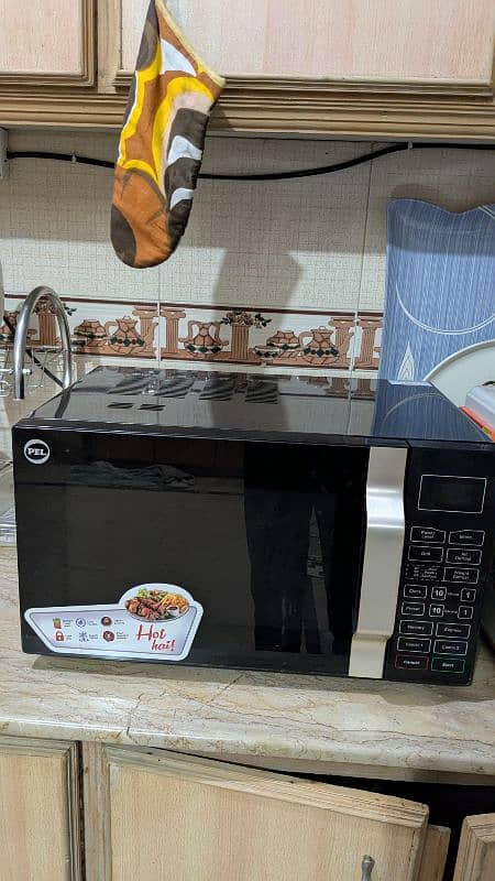 microwave oven in new condition 0