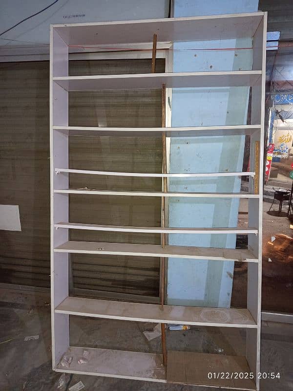 4 racks and 1 counter for sale 3