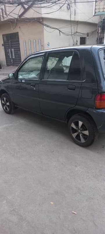 Daihatsu Cuore 2007 Total Genuine paint 2