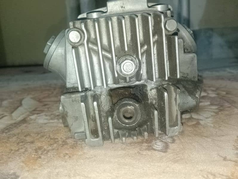 Honda seventy Head clinder 1