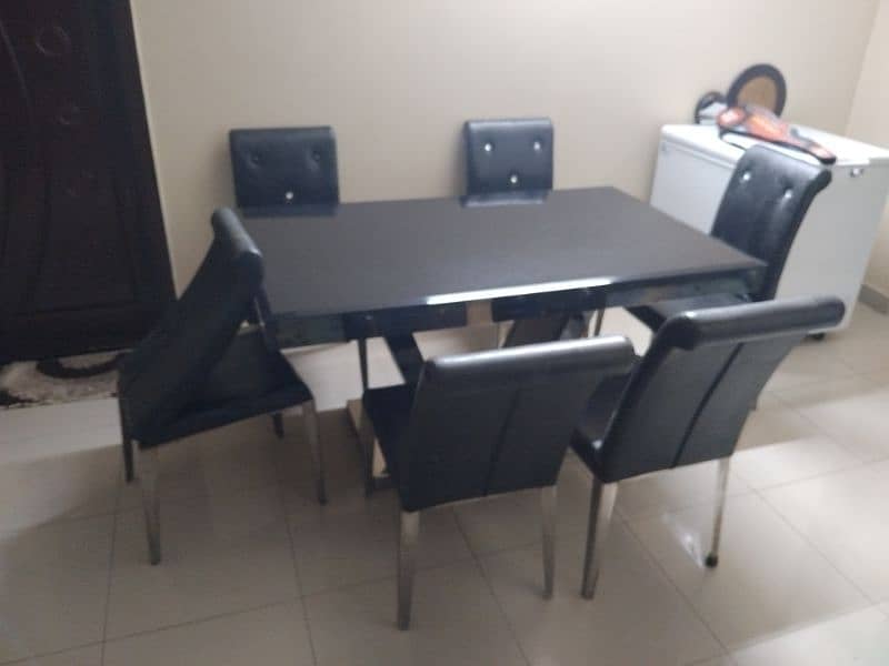 dining table for sale ss and glass top 2