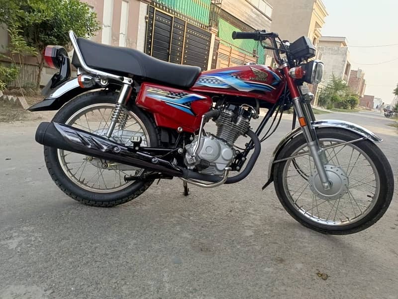 honda 125 with new 2024 sticker 1