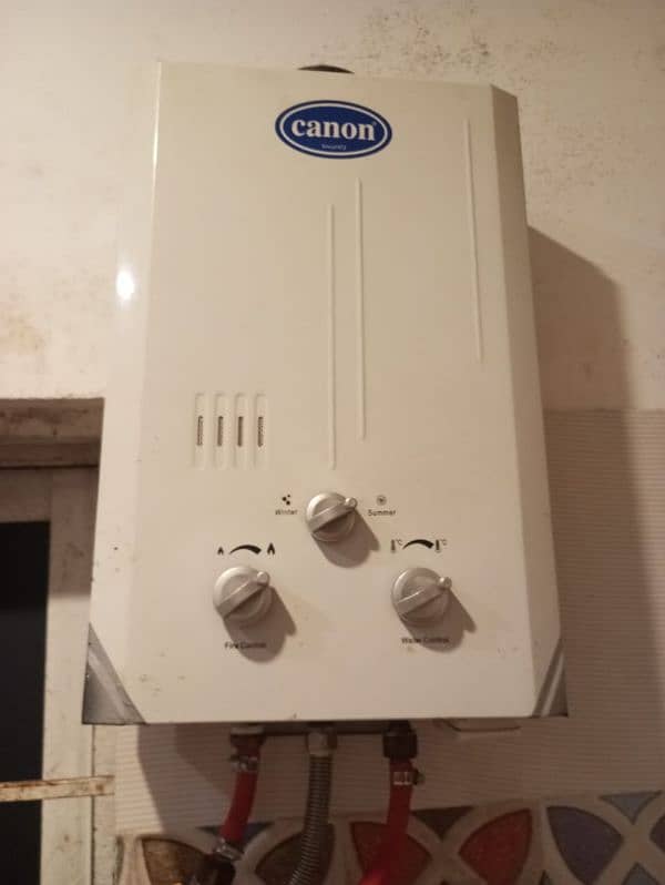 Canon instant geyser in 10/10 working condition installed 0