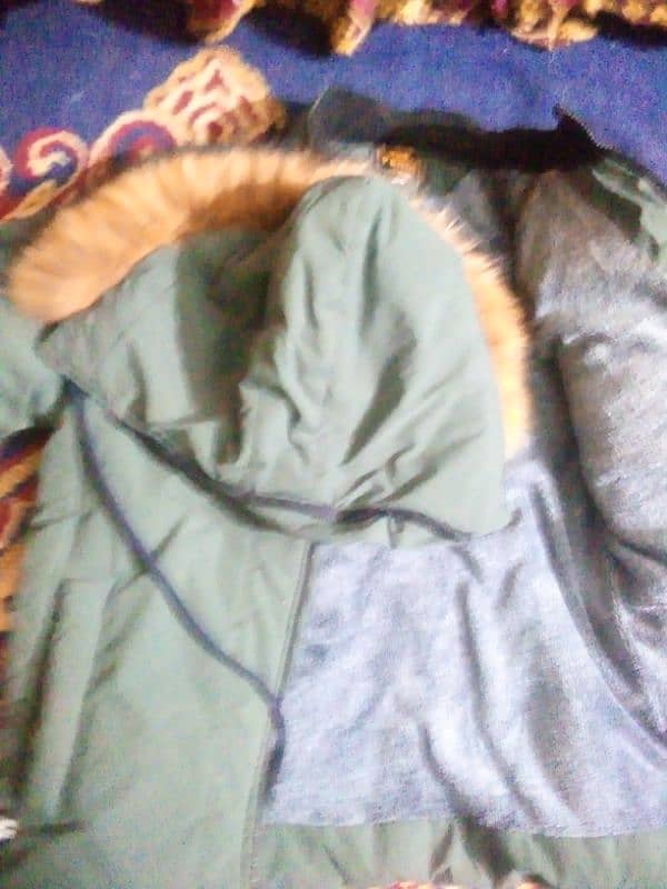 New style furr jacket with cap gents ha all ok new ha use nahi uhi 1