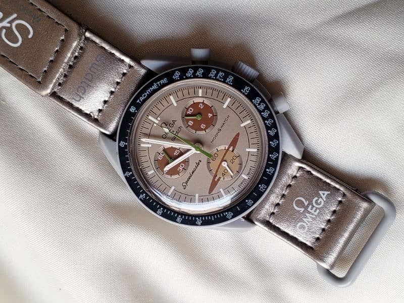 OMEGA AND SWATCH CORONAGRAPH WATCH 13