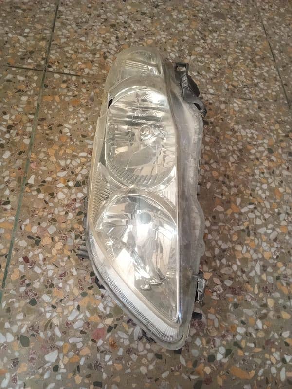 Genuine Corolla 2010 Headlight left 0