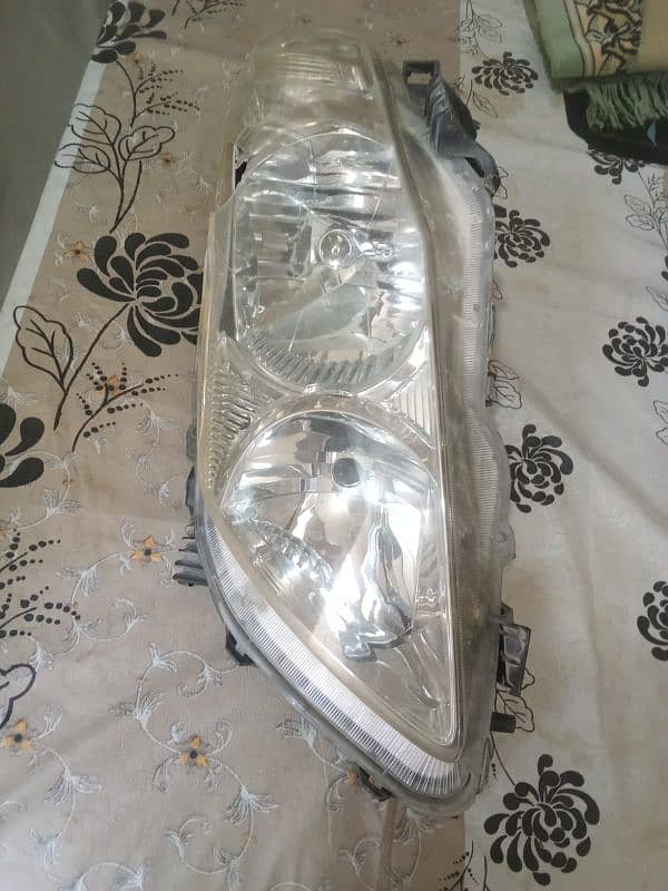 Genuine Corolla 2010 Headlight left 2