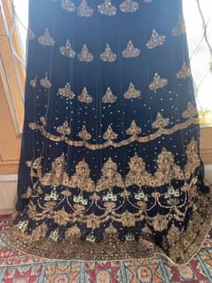 heavily embroidered gem stone formal lehanga with top