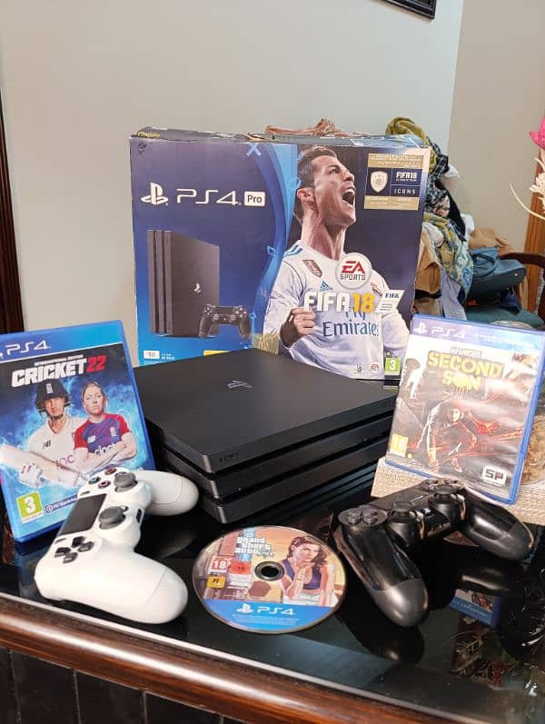 PS 4 PRO 1TB Sealed with 2 original Controllers and games 2