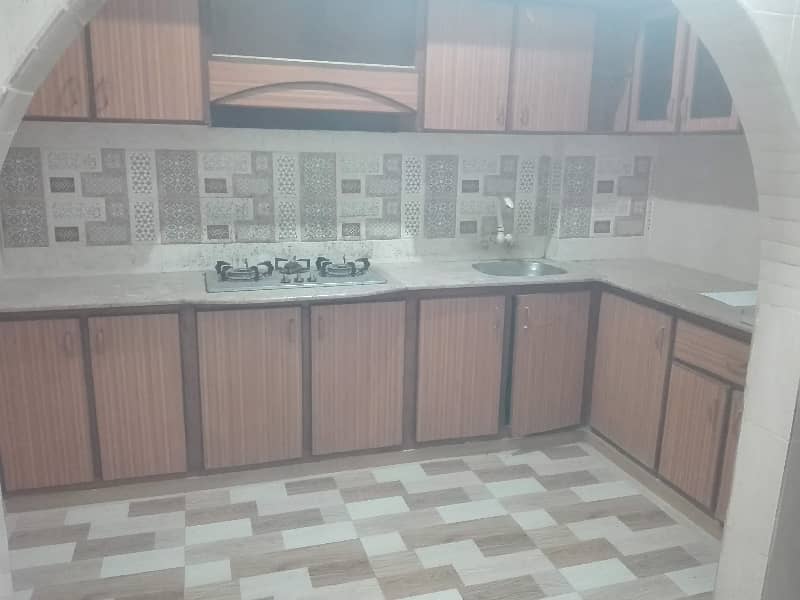 two bed lounge tile flooring apartment for rent in johar 1