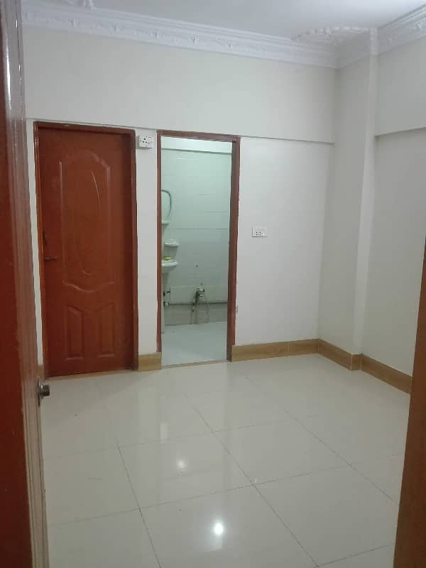 two bed lounge tile flooring apartment for rent in johar 2