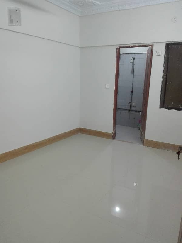 two bed lounge tile flooring apartment for rent in johar 5