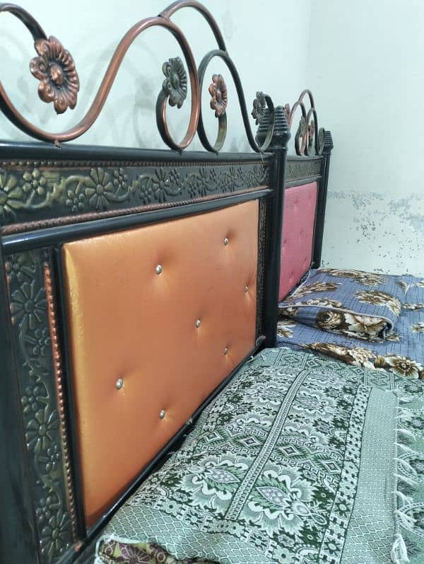 two single iron beds . . Rs. 18000 3