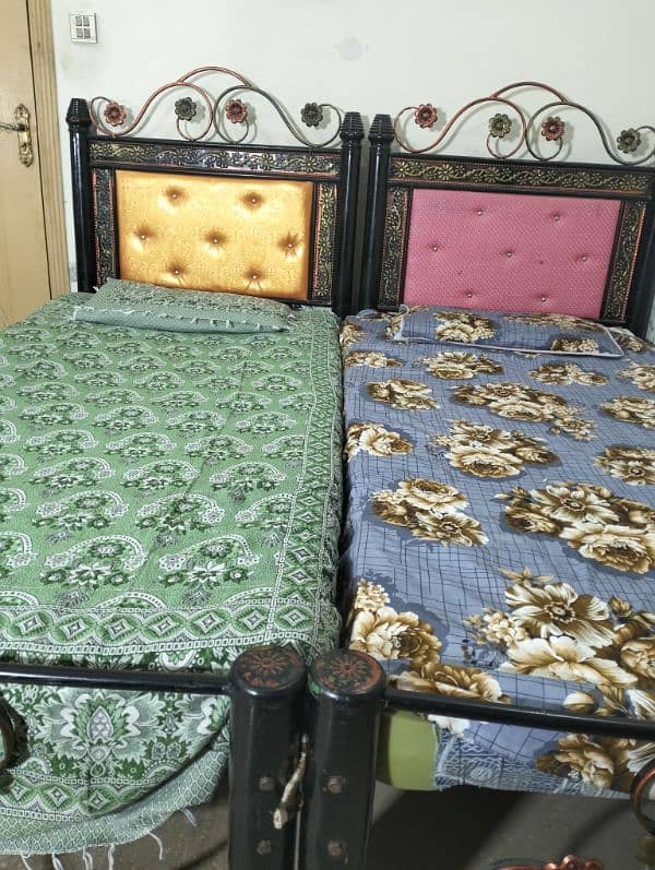 two single iron beds . . Rs. 18000 4